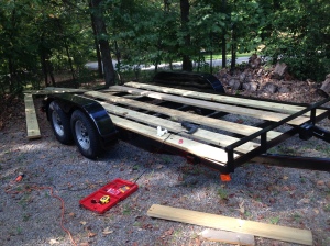 We doubled up the floorboards of the trailer to get it level with the lip of metal frame.